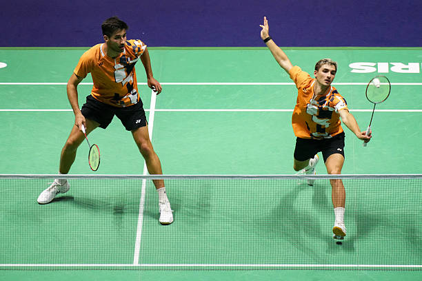 羽毛球比赛：先得多少分即可锁定胜局？